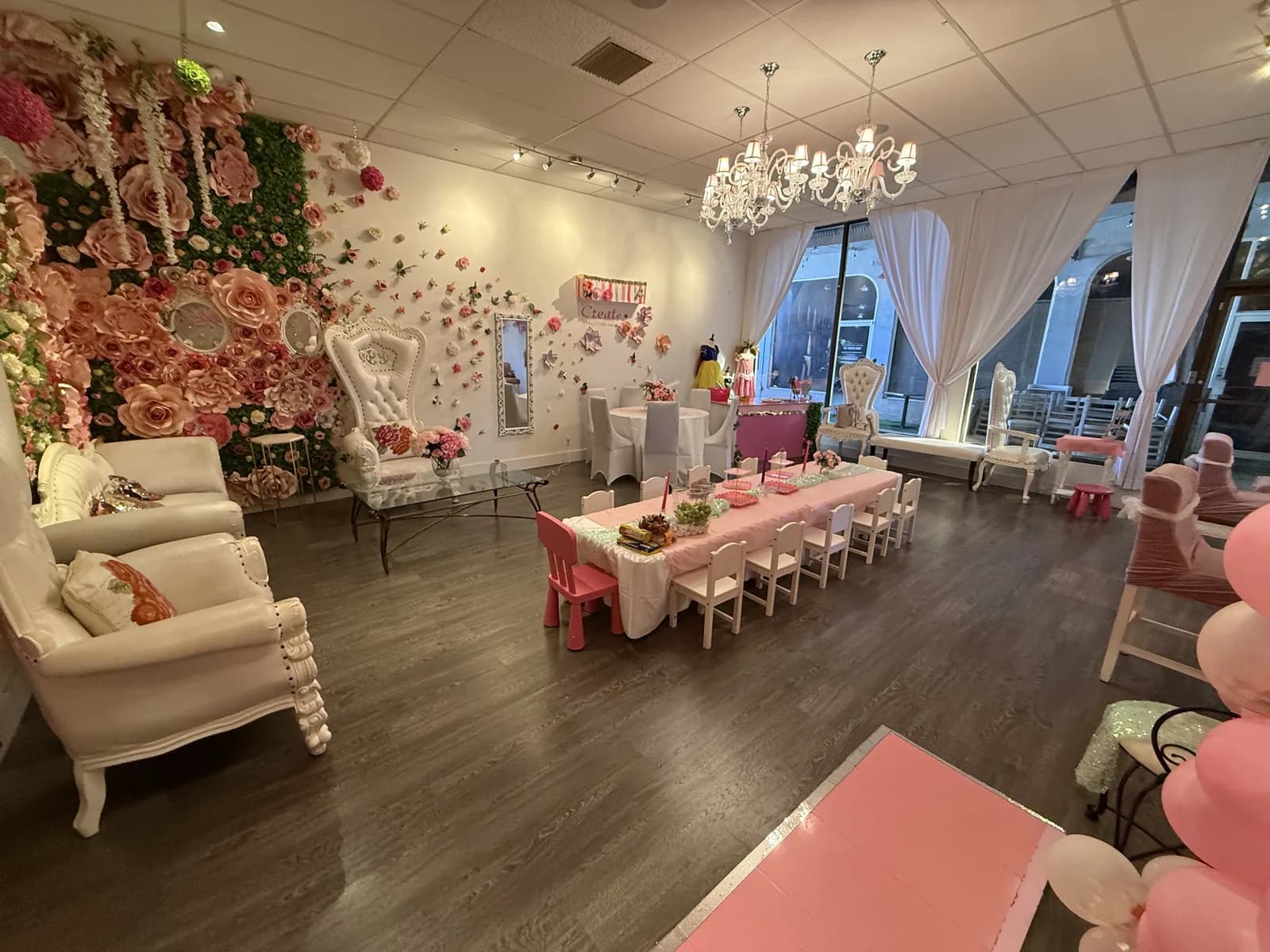 Princess spa party venue with chandelier and flower wall at Pretty in Pink Princess Spa, Fort Lauderdale FL